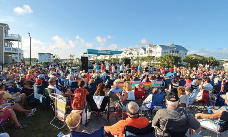 People enjoying free summer concerts at Ocean Isle Beach
